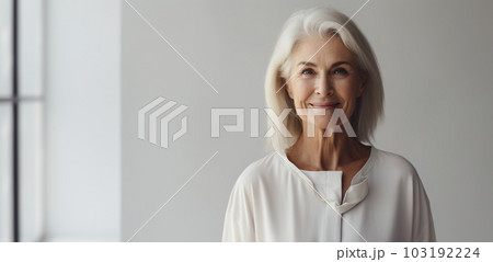Elderly woman wearing a black and white outfit in a minimalist living room - generative AI, AI generated Elderly woman wearing a black and white outfit in a minimalist living room - generative AI, AI generated 103192224