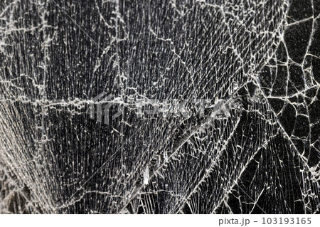 glass broken into a large number of pieces and cracks glass broken into a large number of pieces and cracks 103193165