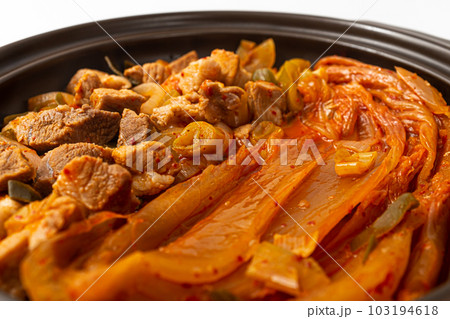 Pork aged kimchi steamed dish on white background Pork aged kimchi steamed dish on white background 103194618