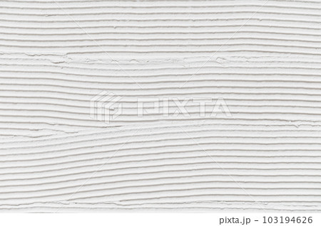 Wall surface with adhesive paste before laying a tile 103194626