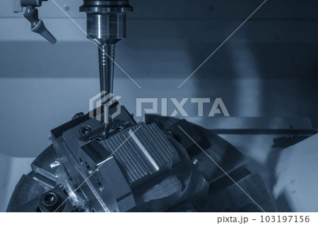 The 5-axis CNC milling machine cutting the automotive parts with ball end mill tool. 103197156