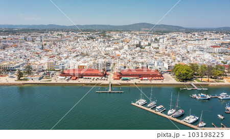 Aerial view of Portuguese fishing town of Olhao with a view the Ria Formosa Marine Park. Sea port Aerial view of Portuguese fishing town of Olhao with a view the Ria Formosa Marine Park. Sea port 103198225
