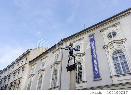 Moravia - statue of 11 year old Austrian . Little Mozart stands on the piano with a tiny wing Moravia - statue of 11 year old Austrian . Little Mozart stands on the piano with a tiny wing 103199237