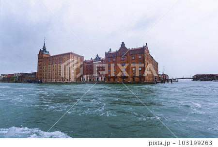 Venice, Italy - May 2023 Hilton Molino Stucky Venice hotel, on Giudecca island. Venice, Italy - May 2023 Hilton Molino Stucky Venice hotel, on Giudecca island. 103199263