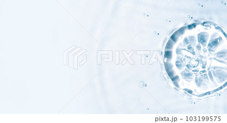 The texture of water on a white background in bright sunlight. 103199575
