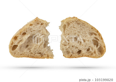 Two slices of fresh Ciabatta bread on a white isolated background. Slices hang or fall on a white background. The concept of Italian bread baking or delicious breakfast. 103199820