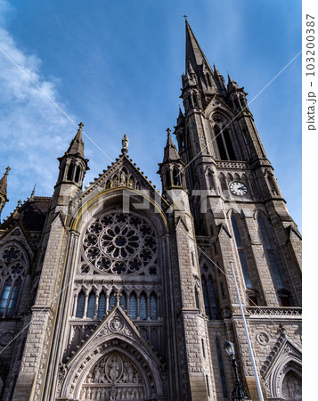 Catholic Cathedral in Ireland, Gothic style. The Cathedral Church of St Colman known as Cobh Cathedral, or Queenstown Cathedral, single-spire cathedral in Cobh, Ireland. Catholic Cathedral in Ireland, Gothic style. The Cathedral Church of St Colman known as Cobh Cathedral, or Queenstown Cathedral, single-spire cathedral in Cobh, Ireland. 103200387
