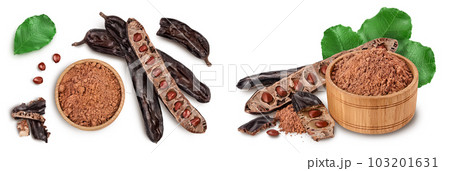 Carob pod and powder isolated on white background with  full depth of field. Top view. Flat lay 103201631