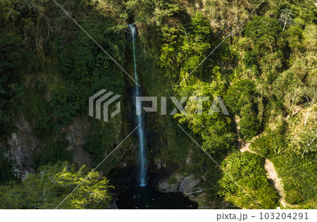 La Fortuna Waterfall in Costa Rica. The waterfall is located on the Arenal River at the base of the dormant Chato volcano. Long exposure. La Fortuna Waterfall in Costa Rica. The waterfall is located on the Arenal River at the base of the dormant Chato volcano. Long exposure. 103204291
