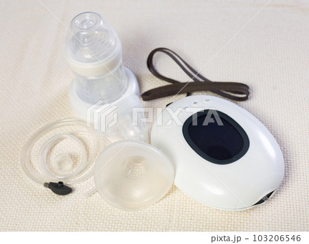 Isolated electric portable breast pump with blank bottle and replaceable nipple for feeding newborn Isolated electric portable breast pump with blank bottle and replaceable nipple for feeding newborn 103206546