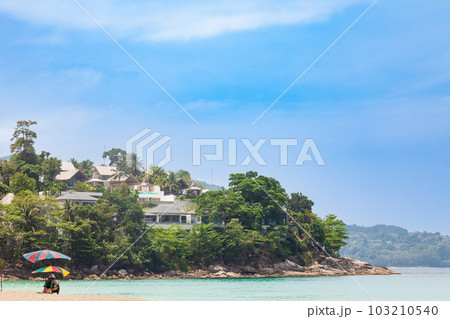 Beautiful Surin beach in Choeng Thale city, Phuket, Thailand with white sand, turquoise water and palm trees 103210540