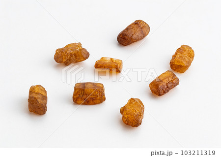 High angle view of brown crystal caramel lump. 103211319