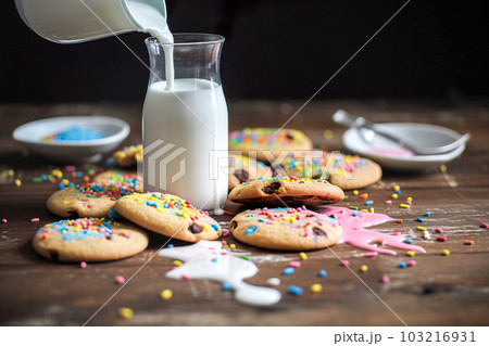 Milk in a glass and cookies on a wooden table, selective focus. Generative AI Milk in a glass and cookies on a wooden table, selective focus. Generative AI 103216931