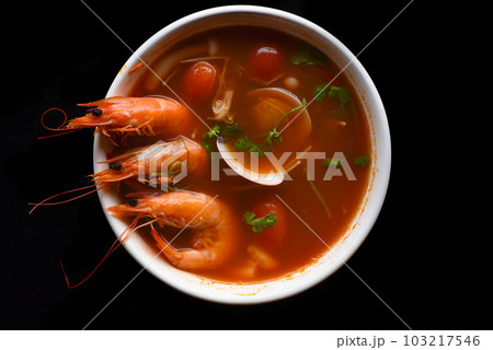 Soup tom yum with rice isolated on black background side view  103217546