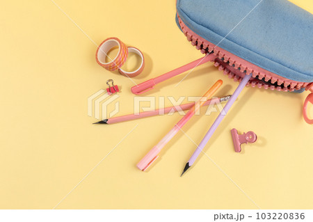school supplies and diary concept, pencil cases and writing tools 103220836