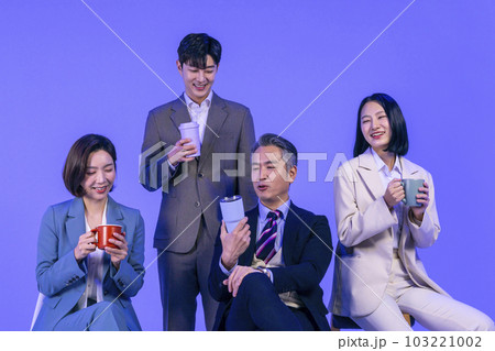 Asian Korean senior, middle aged and young male and female colleagues models in business attire, neon purple studio background, have a chat with coffee Asian Korean senior, middle aged and young male and female colleagues models in business attire, neon purple studio background, have a chat with coffee 103221002