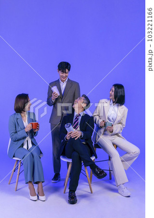 Asian Korean senior, middle aged and young male and female colleagues models in business attire, neon purple studio background, have a chat with coffee Asian Korean senior, middle aged and young male and female colleagues models in business attire, neon purple studio background, have a chat with coffee 103221166