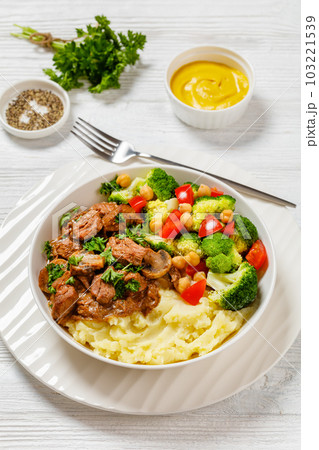 beef mushrooms stew with mashed potato and salad 103221539