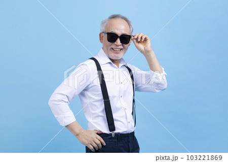 active young senior Korean Asian male wearing sunglasses active young senior Korean Asian male wearing sunglasses 103221869