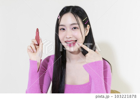 vintage y2k pink retro concept photo of Korean Asian cute woman in party concept 103221878