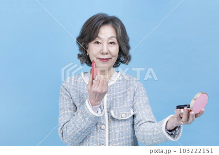 active young senior Korean Asian woman wearing lipstick active young senior Korean Asian woman wearing lipstick 103222151