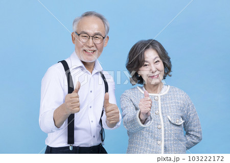 active young senior Korean Asian couple with hand motion active young senior Korean Asian couple with hand motion 103222172