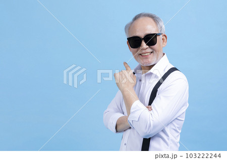 active young senior Korean Asian male wearing sunglasses 103222244