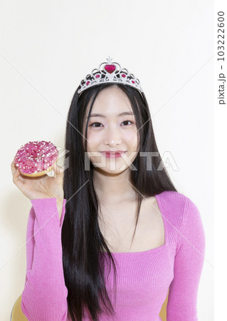 vintage y2k pink retro concept photo of korean asian cute woman in birthday party concept 103222600