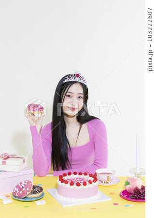 vintage y2k pink retro concept photo of korean asian cute woman in birthday party concept 103222607