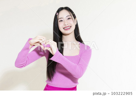 vintage y2k pink retro concept photo of korean asian cute woman with hand motion vintage y2k pink retro concept photo of korean asian cute woman with hand motion 103222905
