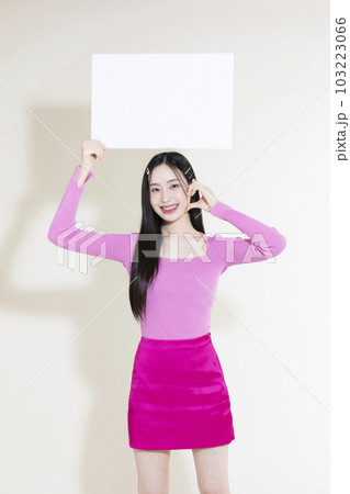 vintage y2k pink retro concept photo of korean asian cute woman holding a frame 103223066