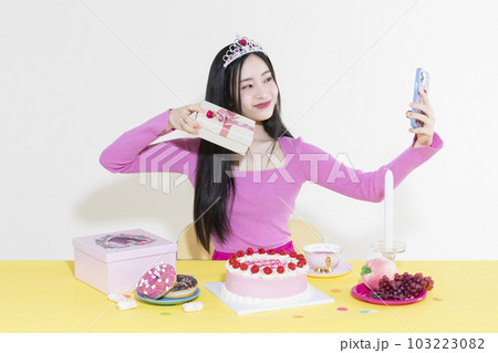vintage y2k pink retro concept photo of korean asian cute woman in birthday party concept vintage y2k pink retro concept photo of korean asian cute woman in birthday party concept 103223082