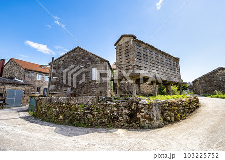 Beautiful village of Fieiro in Spain, unique for its horreos, traditional granary barns 103225752