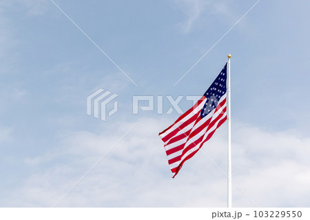 A photo of American flag against the sky A photo of American flag against the sky 103229550