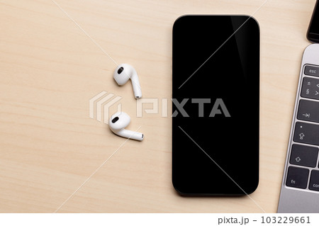 Blank screen smartphone on a desk Blank screen smartphone on a desk 103229661