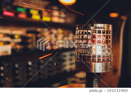 Coals for hookah close-up. Burning coals on the hookah bowl. 103232460