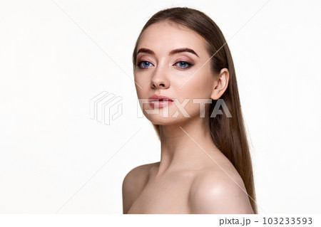 young woman with perfect skin on white background. 103233593