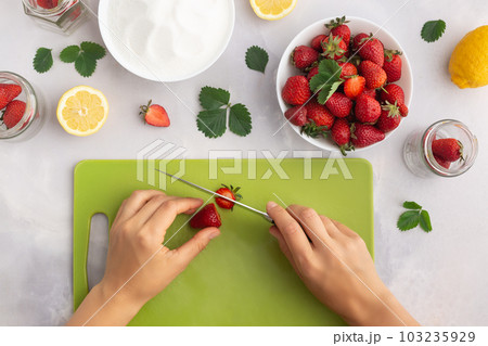 Jam strawberries preparation process. Season canning berries and cooking homemade jam concept 103235929
