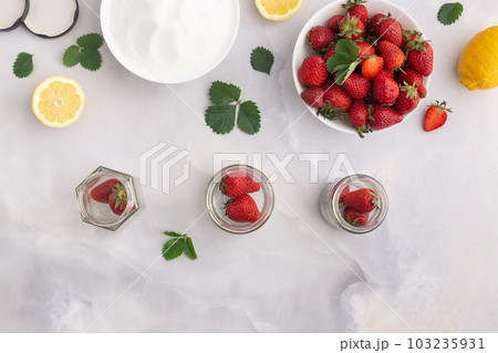 Jam strawberries preparation process. Season canning berries and cooking homemade jam concept 103235931