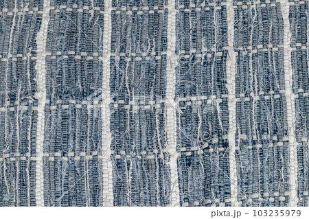 Blue and white old checked fabric close-up pattern Blue and white old checked fabric close-up pattern 103235979