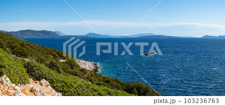 Lefkada sea shore cliffs with vivid greenery view Lefkada sea shore cliffs with vivid greenery view 103236763