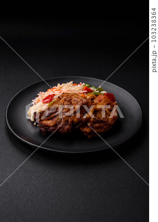 Delicious boiled rice with peppers, peas, asparagus beans and carrots and fried chicken 103238364
