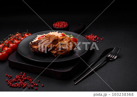 Delicious boiled rice with peppers, peas, asparagus beans and carrots and fried chicken 103238368