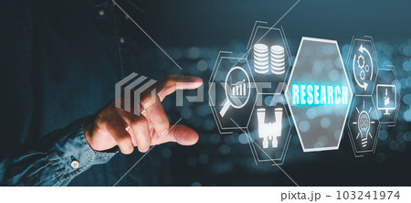 Research concept, Person hand touching research icon on virtual screen with blue bokeh background. Research concept, Person hand touching research icon on virtual screen with blue bokeh background. 103241974