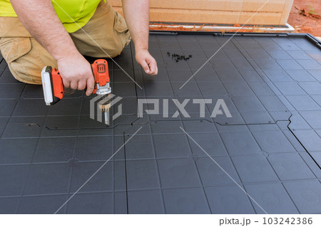 Properly screwing plastic base platform ensures stability of plastic vinyl storage shed. 103242386