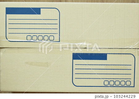 brown post box packaging put on wood floor brown post box packaging put on wood floor 103244229