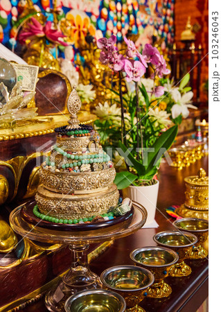 Tibetan Mongolian Buddhist shrine with ornate gold decor 103246043