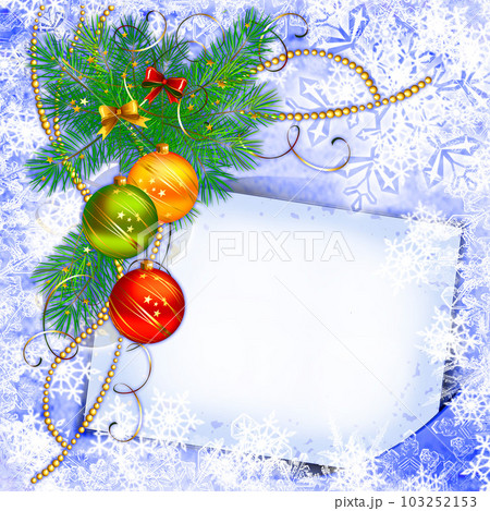 A sheet of paper and Christmas tree toys on a branch 103252153