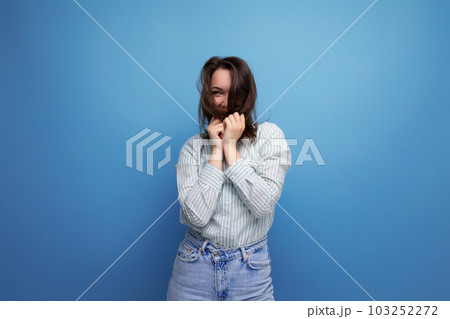 happy pretty 25s brunette woman with well-groomed silky straight hair happy pretty 25s brunette woman with well-groomed silky straight hair 103252272