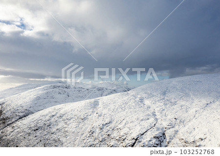 The snow covered Glenveagh Mountains and Glen in County Donegal - Republic of Ireland 103252768